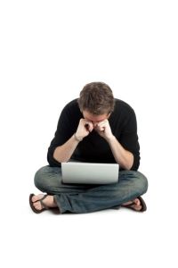 photo-24774920-stressed-man-with-laptop