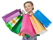 photo-24821962-a-happy-woman-with-shopping-bags