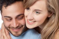 photo-24769665-a-young-couple-smiling