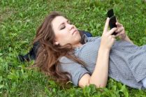 photo-24745211-woman-and-cell-phone (1)