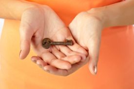 photo-24775881-open-hands-with-key