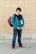 photo-24718877-handsome-teenage-boy-holding-books.